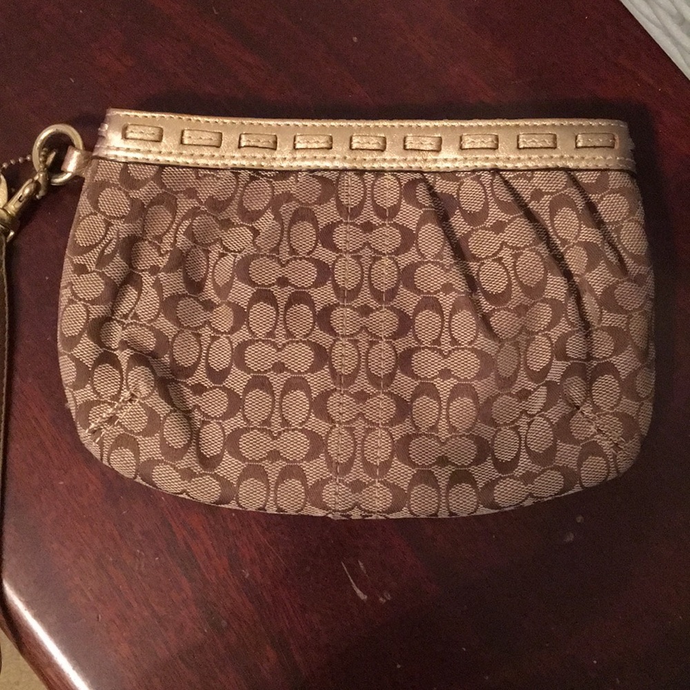 Coach gold & tan wristlet